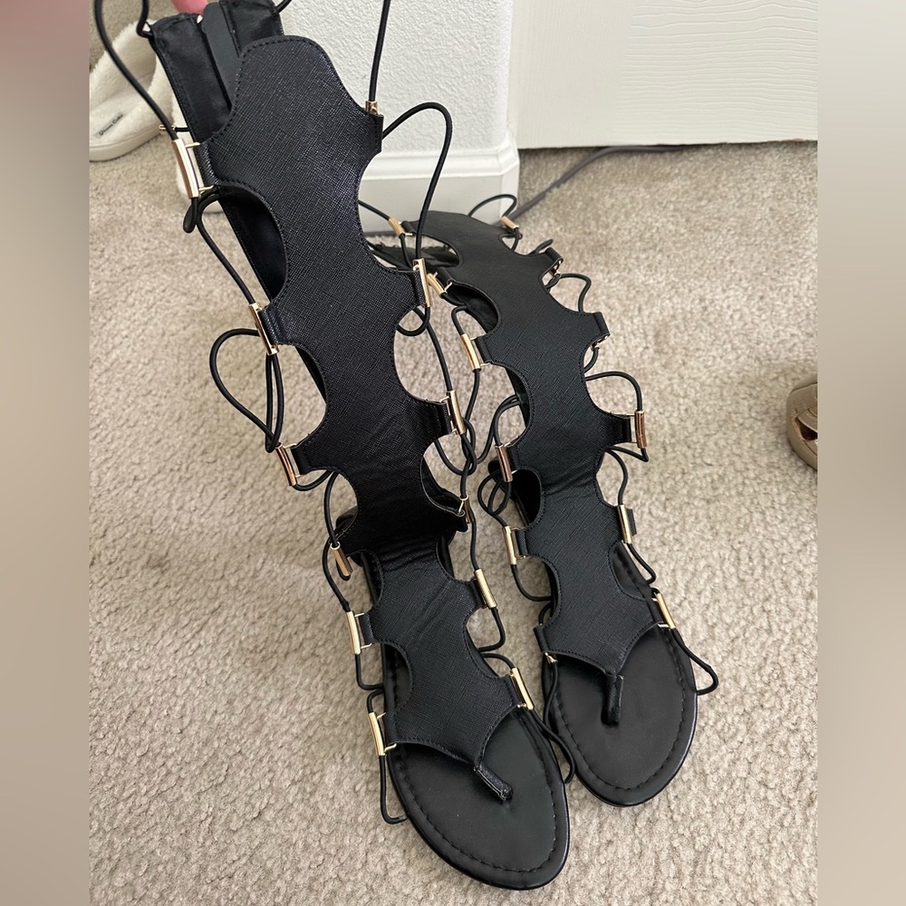 Roman Style Black And Gold High Sandals